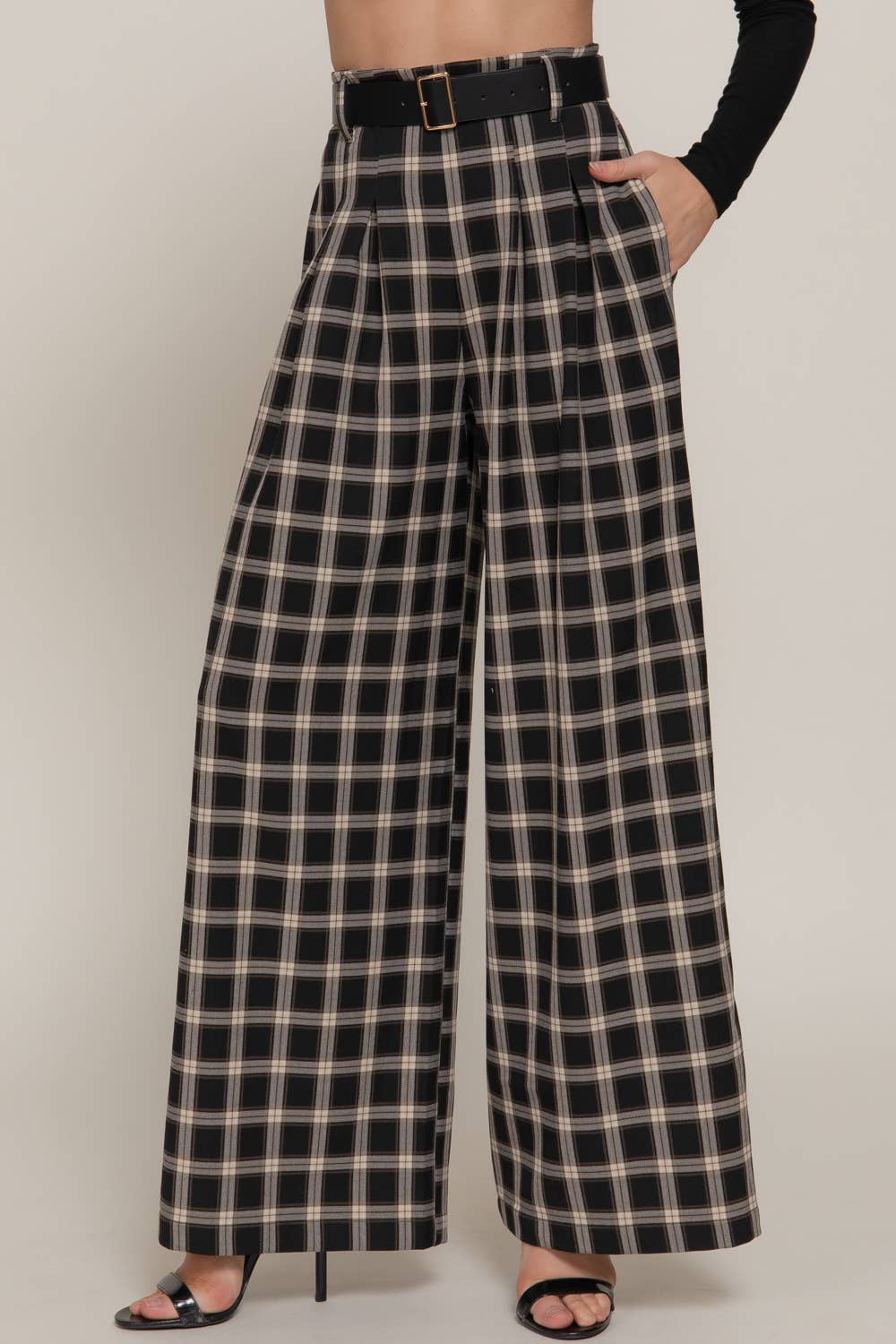 Woman wearing Plaid pants. 